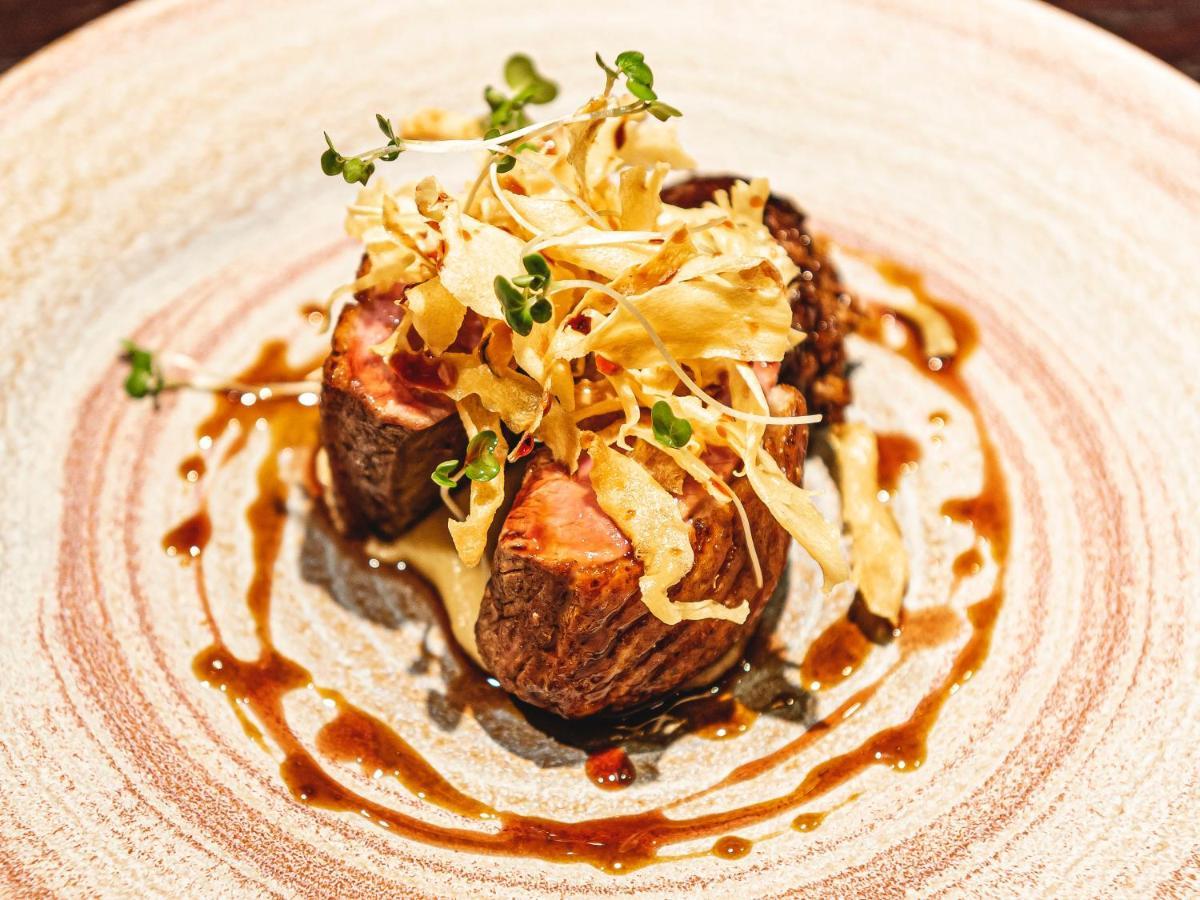 Dakota Leeds Hotel Leeds  Bagian luar foto A potato prepared with a potato chip topping